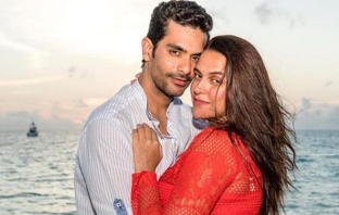 Neha Dhupia and Angad Bedi file photo