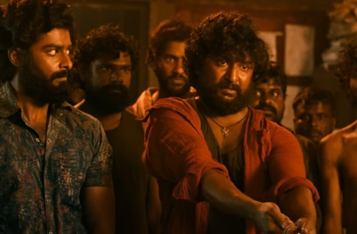 still of Nani and other characters from movie Dasara